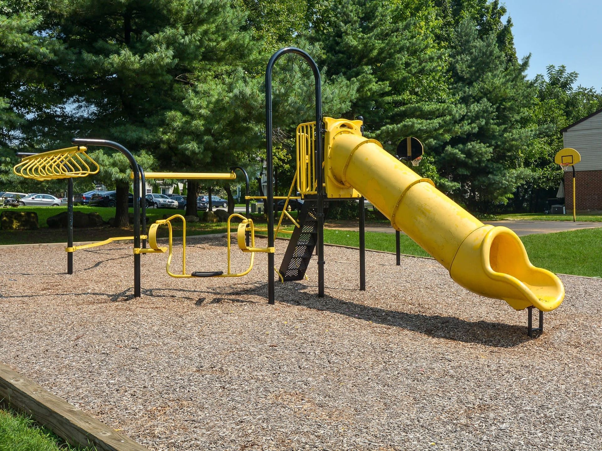Yellow playground with slide and climbing equipment in a mulch-covered park. Contact us today to learn more about our pet-friendly 1, 2, 3, and 4-bedroom apartments for rent in Bethlehem, PA. At River Pointe Townhomes, you’ll enjoy a prime location near Lehigh River and all the amenities and extras that make your life comfortable. We can’t wait to welcome you home!