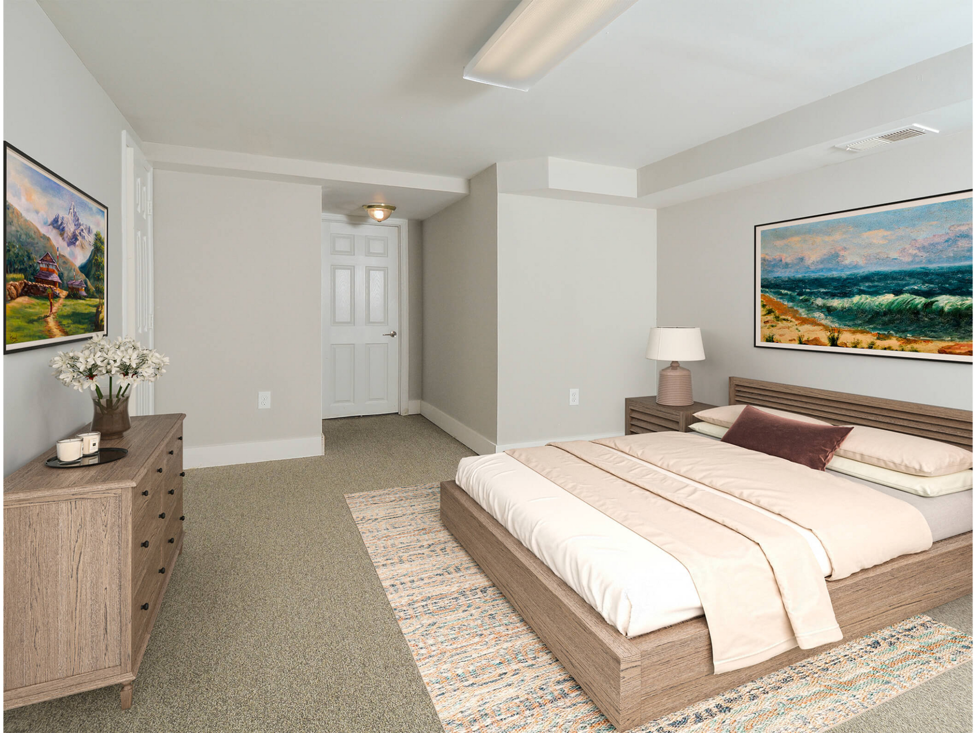 Furnished bedroom with a wooden platform bed, dresser, nightstand, and wall art. Contact us today to learn more about our pet-friendly 1, 2, 3, and 4-bedroom apartments for rent in Bethlehem, PA. At River Pointe Townhomes, you’ll enjoy a prime location near Lehigh River and all the amenities and extras that make your life comfortable. We can’t wait to welcome you home!