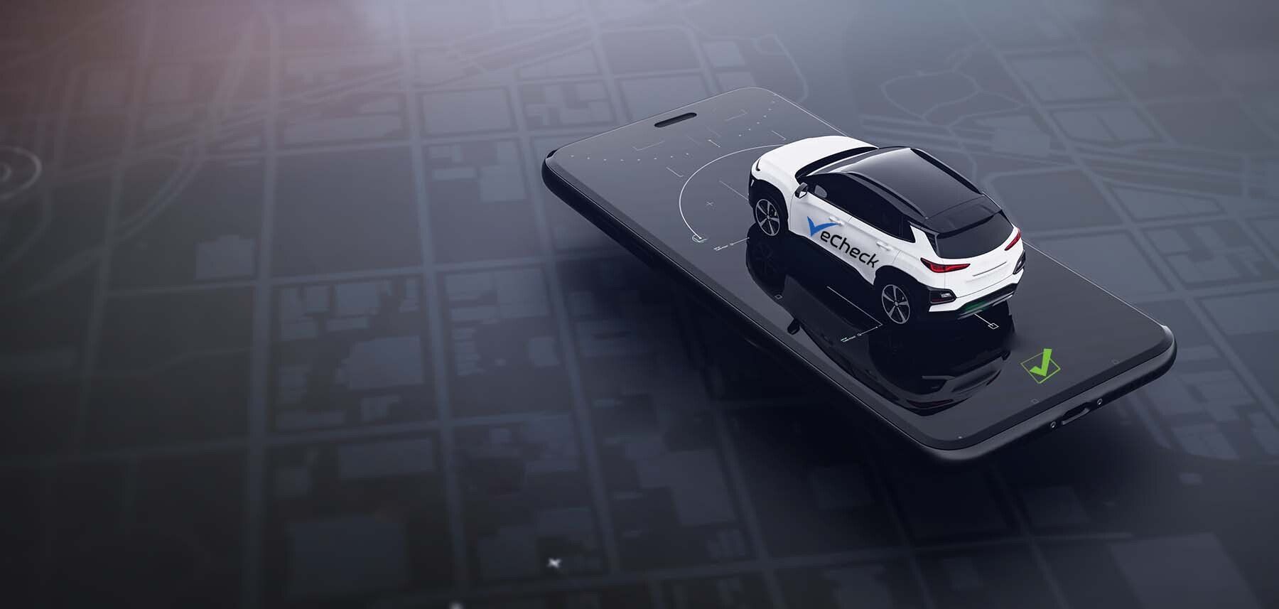 A car is sitting on top of a cell phone.