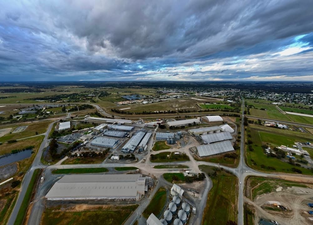 An Aerial View of a Large Industrial Area  — Land to Mow Garden Services Wagga In Junee, NSW