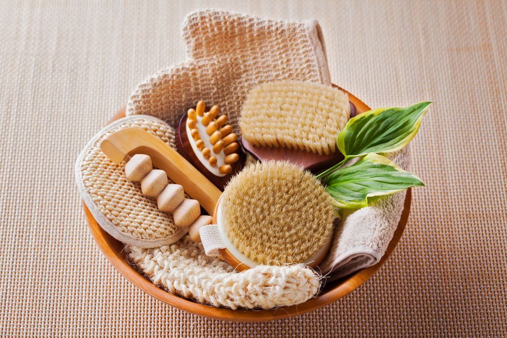 Wooden Bowl Filled With Bath Brushes, Loofahs — A1 Coffs Harbour in Coffs Harbour, NSW