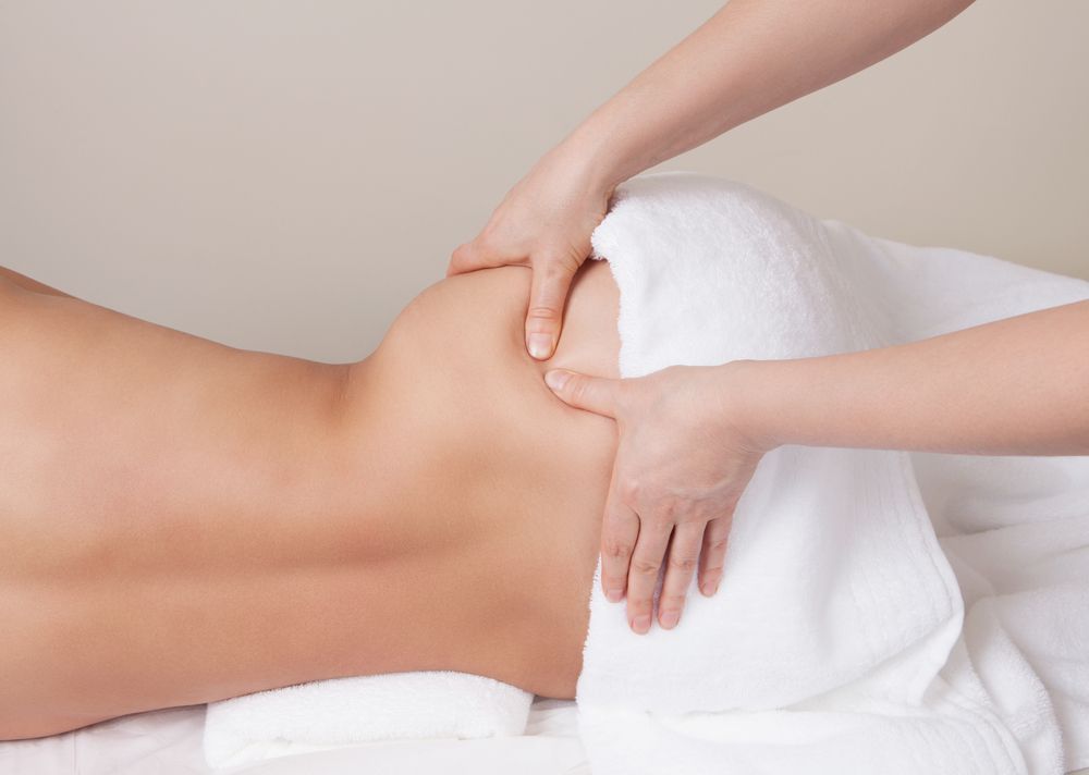 Person Receiving a Massage on Their Lower Back and Hip — A1 Coffs Harbour in Coffs Harbour, NSW