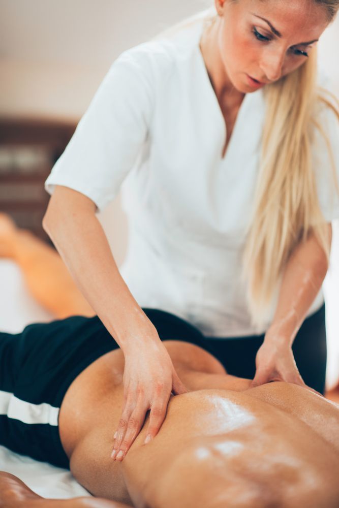 Person Receiving a Back Massage From a Therapist — A1 Coffs Harbour in Coffs Harbour, NSW