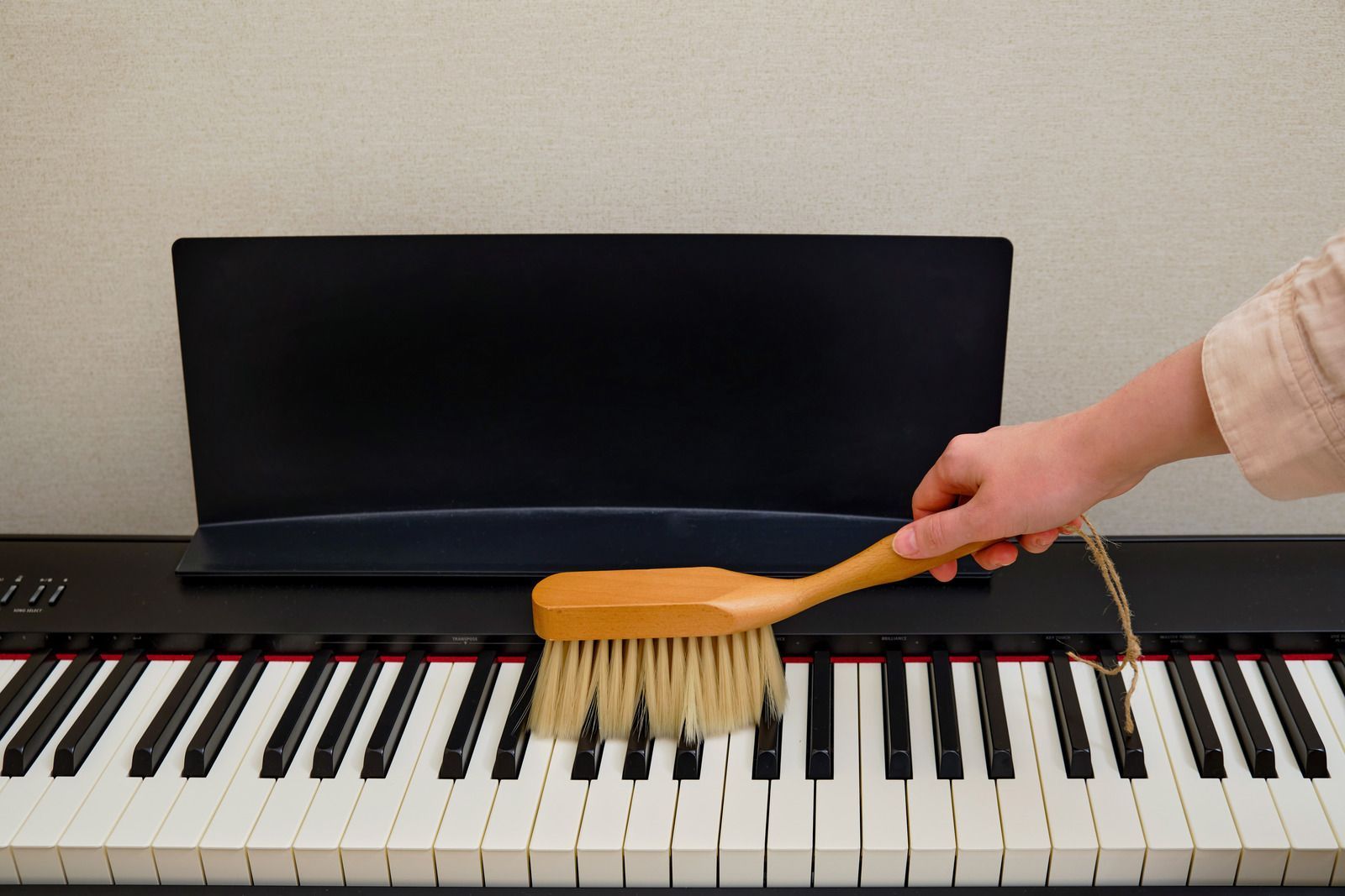 A man is working on a kitchen in a house under construction