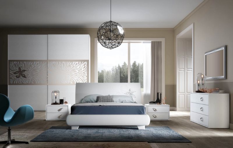 camera con arredamento in legno chiaro