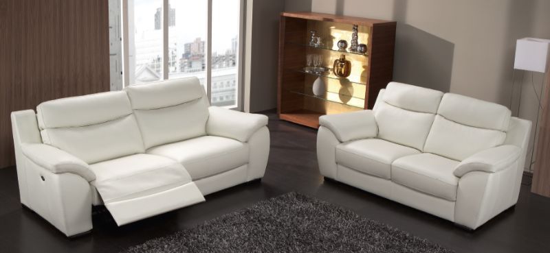 Divani in pelle con poggia piedi