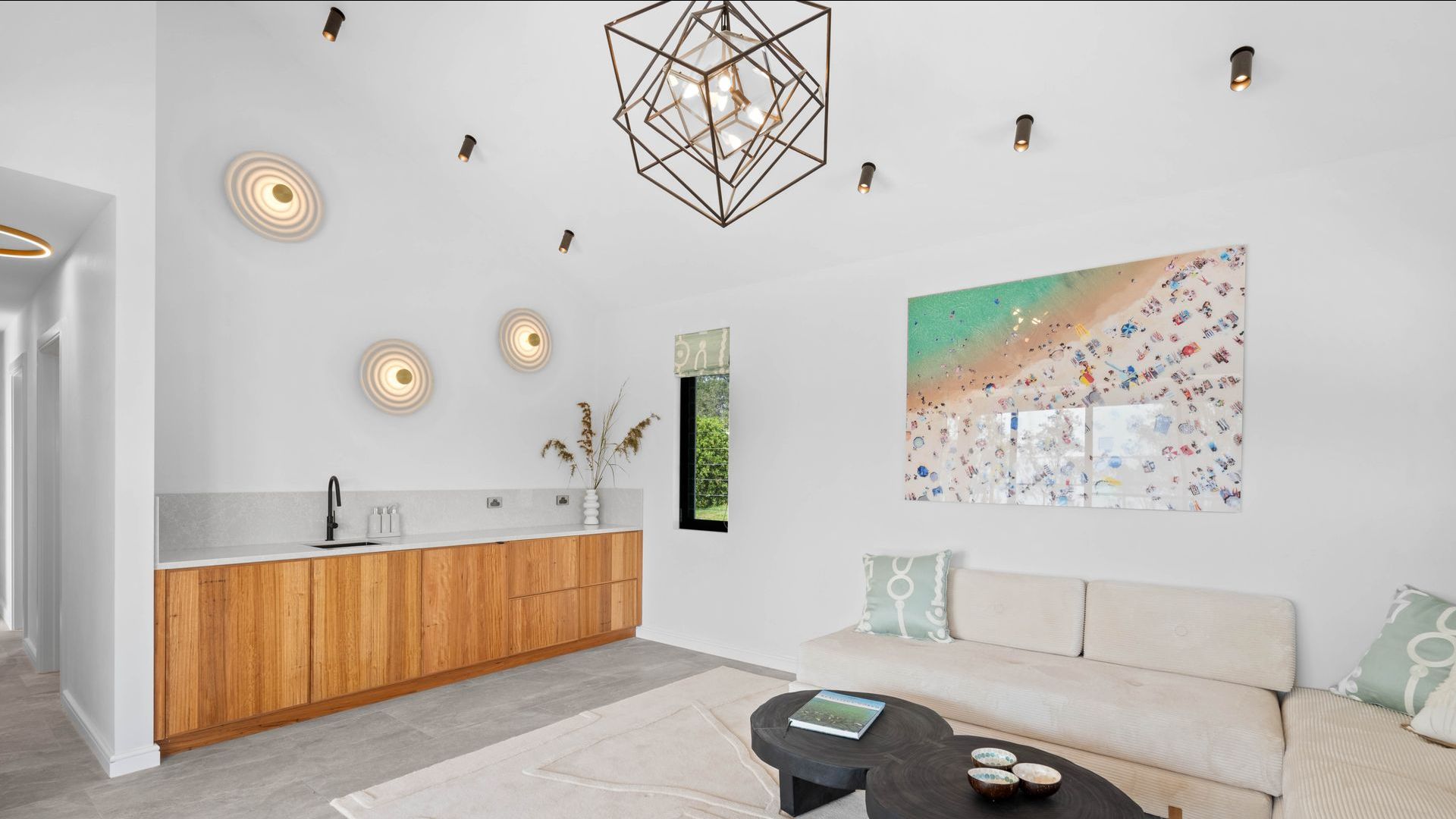 A Kitchen With Wooden Cabinets And A Large Island In The Middle — Concept Design Kitchens & Joinery In Forster, NSW