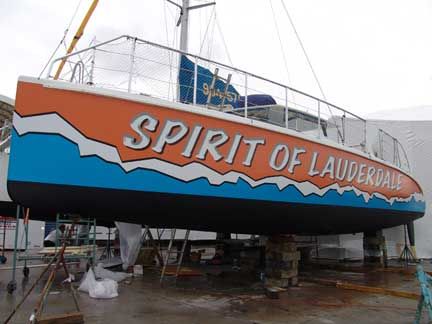 A boat with the words spirit of lauderdale painted on it
