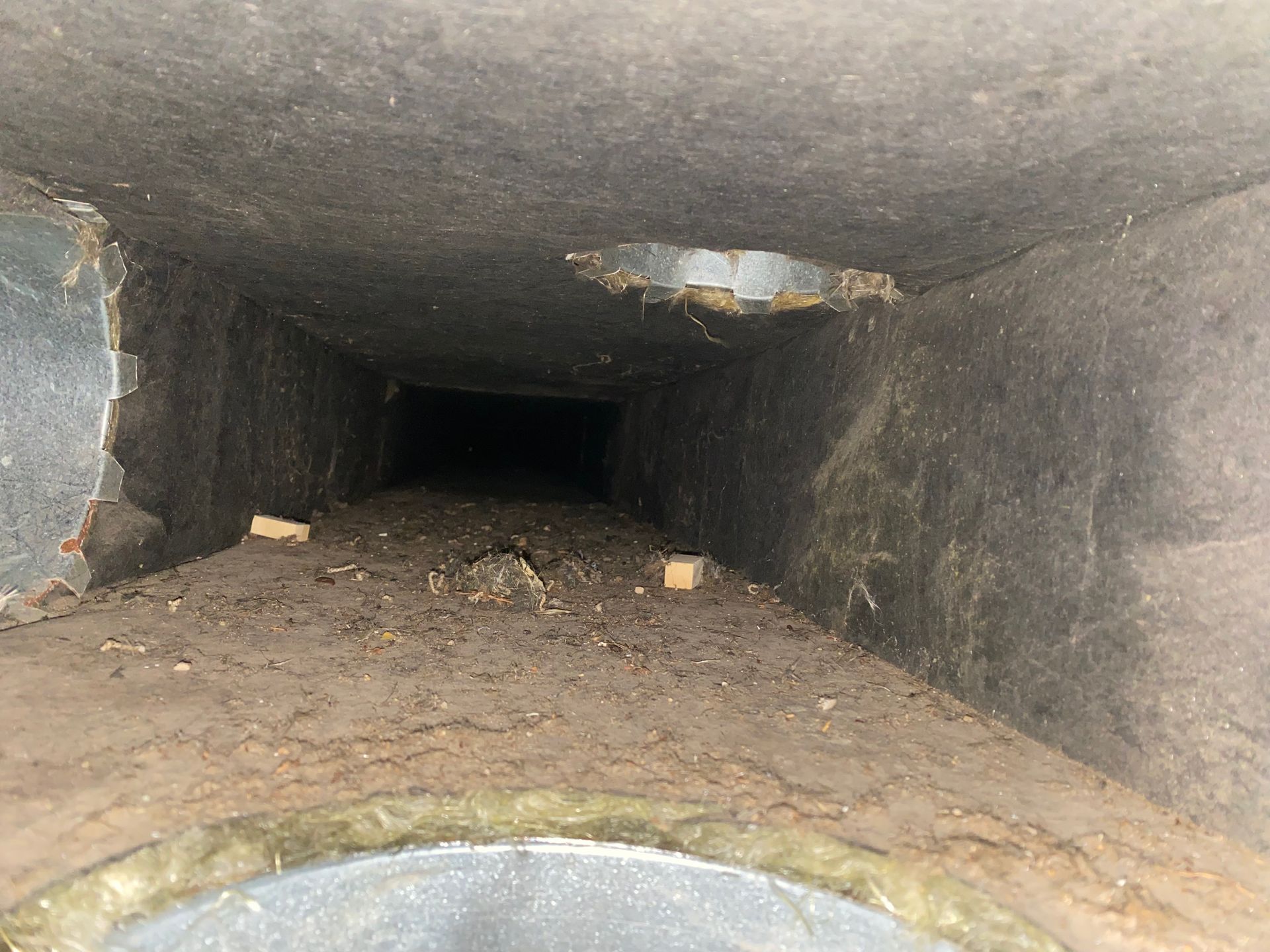 A hole in a wall that looks like a tunnel