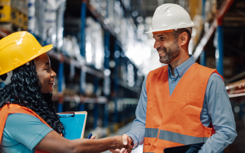 warehouse operations manager working with staff