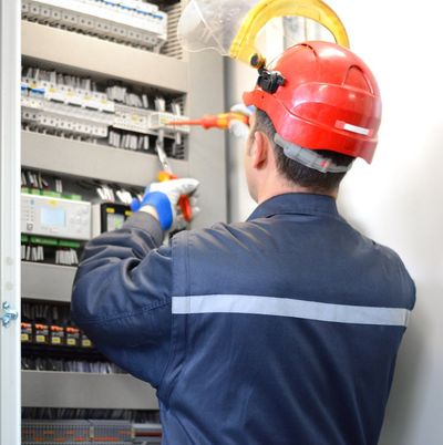 Electrician Checking Electrical Panel — Seven Valleys, PA — Smeltzer Electrical Service, LLC.