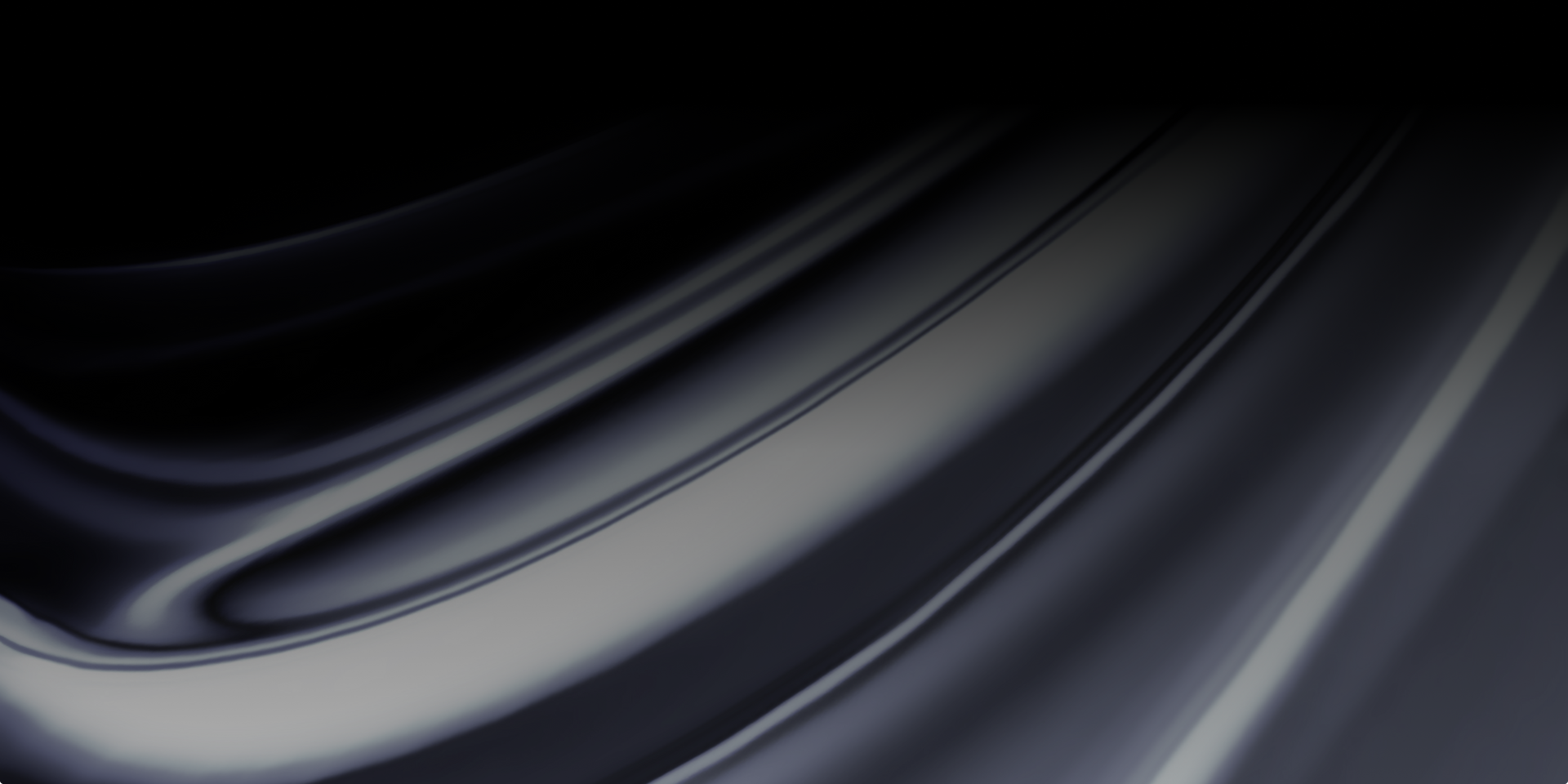 A close up of a black and white swirl on a black background.