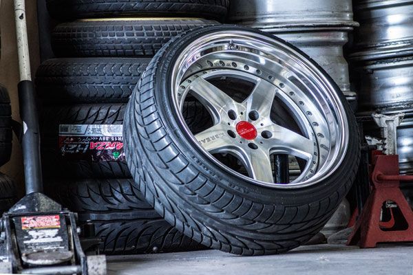 A Tyre Is Sitting on Top of A Stack of Tyres — Lismore Car Repairs in Lismore, NSW