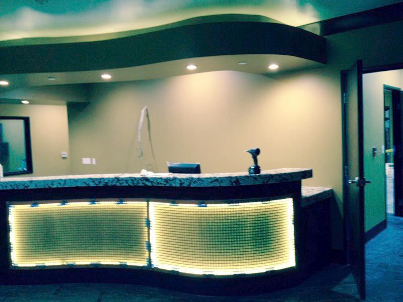 A reception desk with a drill on top of it