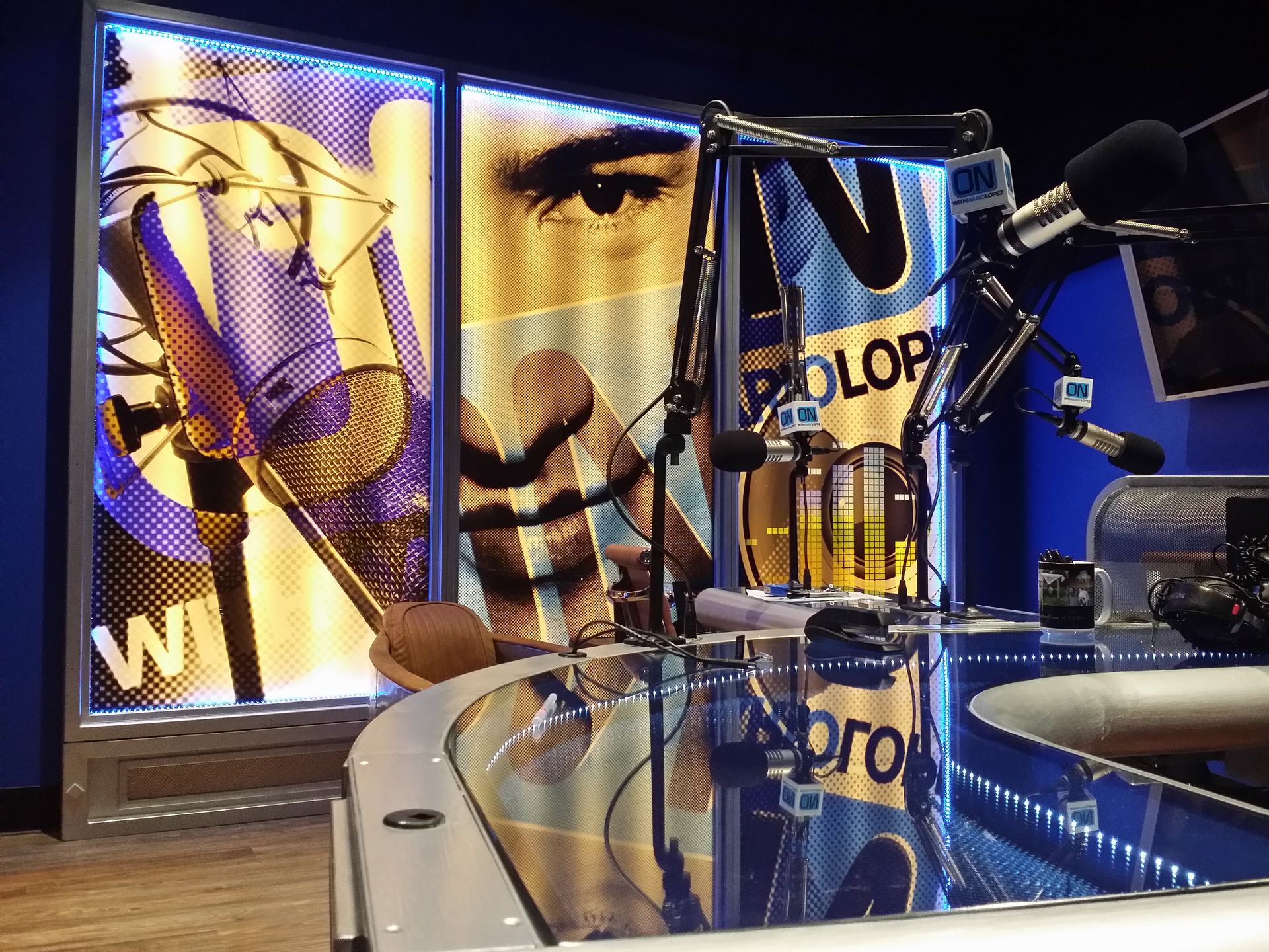 A studio with a microphone and a sign that says pro