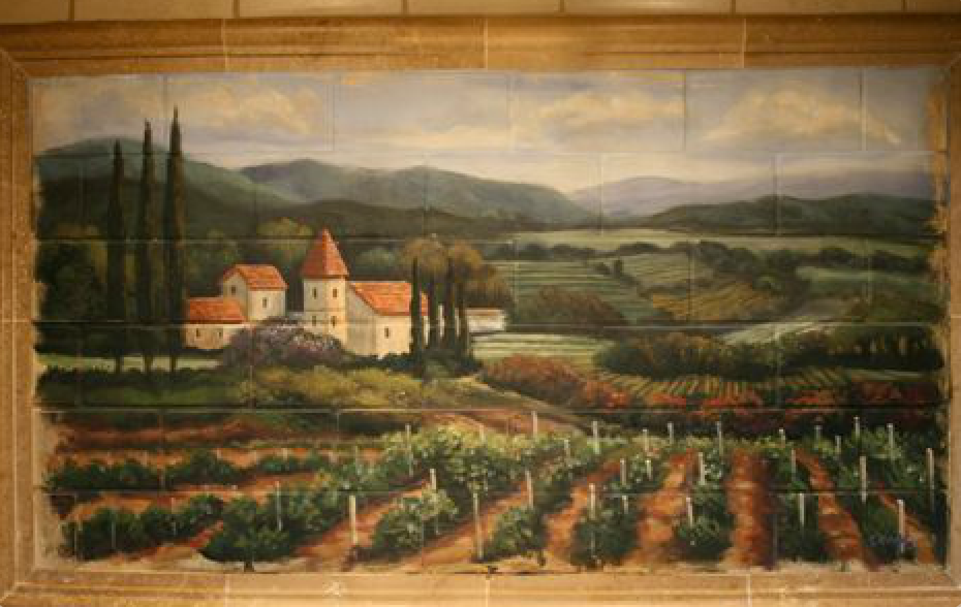 A painting of a vineyard with a house in the background