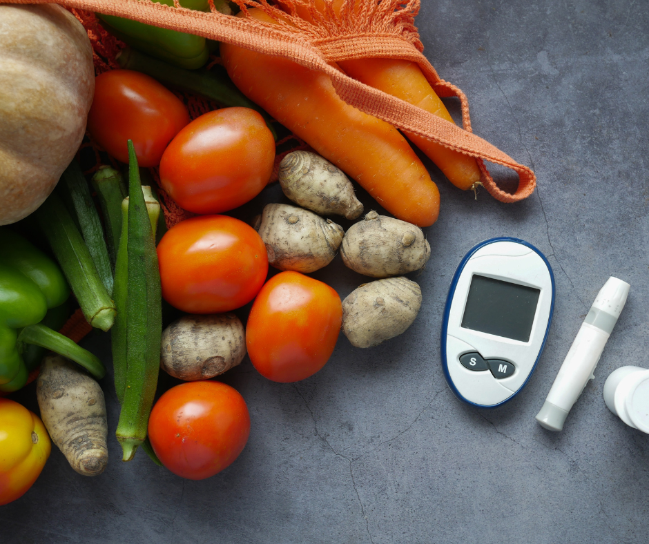 Fresh vegetables and glucose meter symbolizing healthy diabetes management