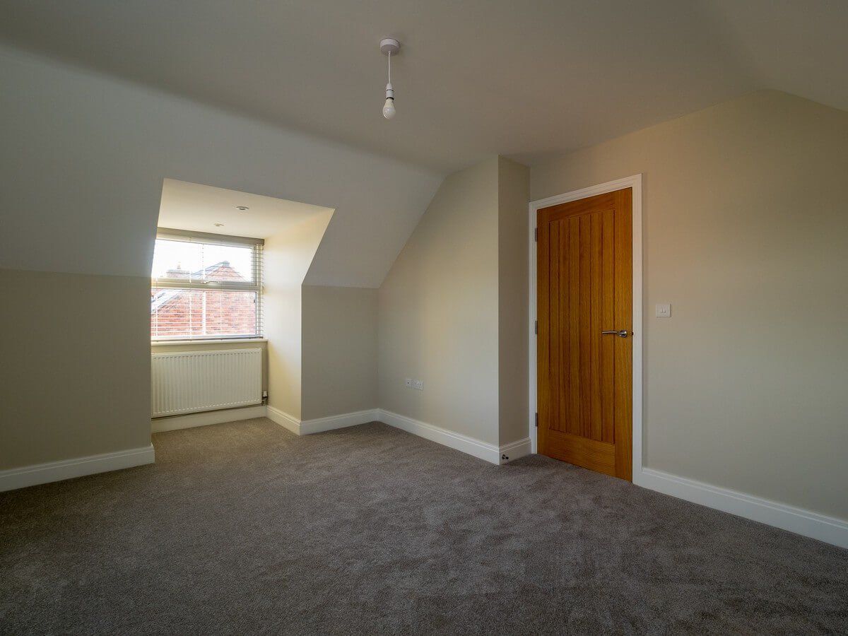 small window in top level bedroom