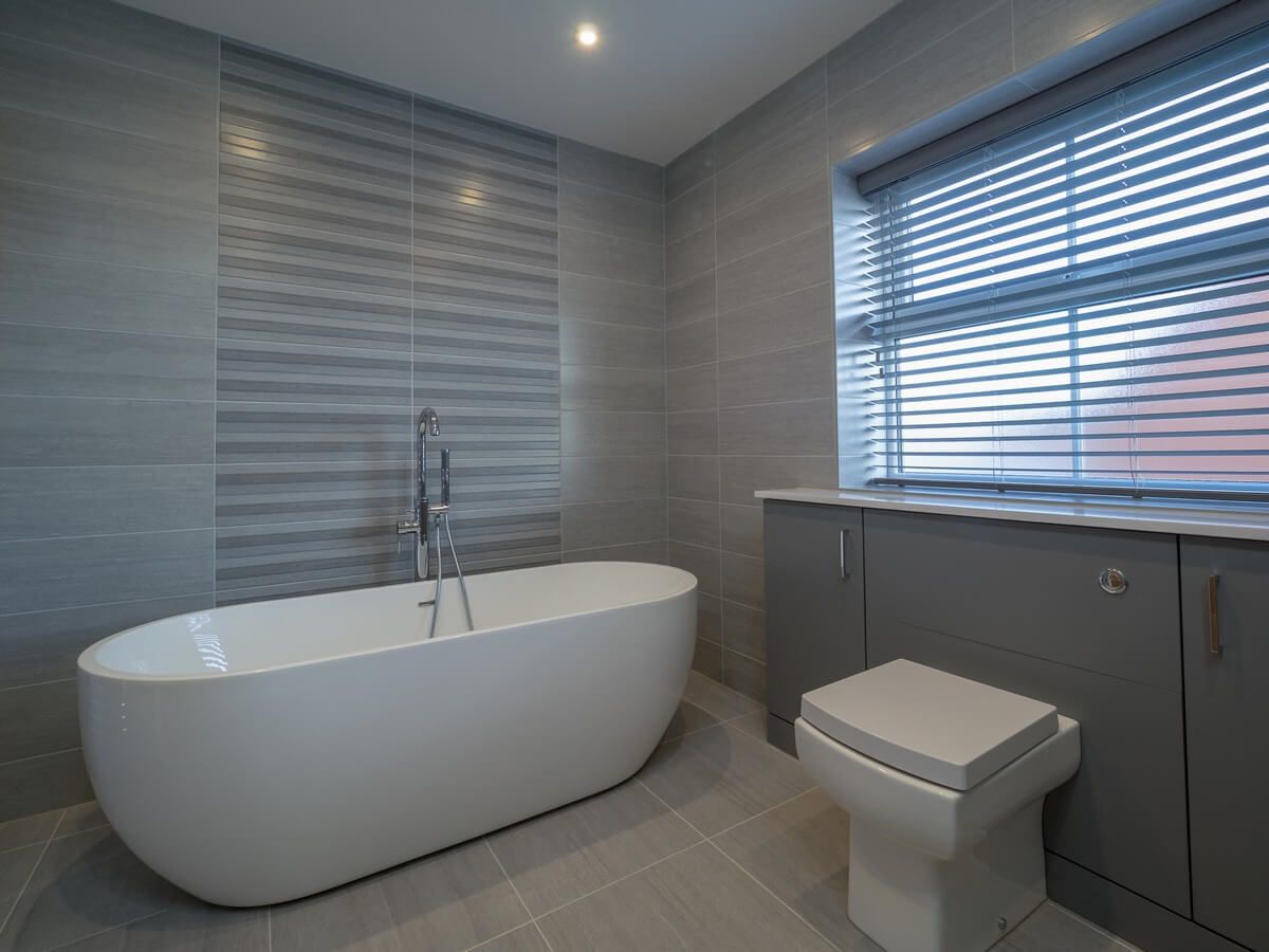 modern bathroom with white bathtub 2