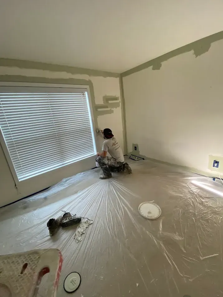Interior painting by Oasis Painting & Drywall LLC in Philadelphia, PA — green walls with white trim