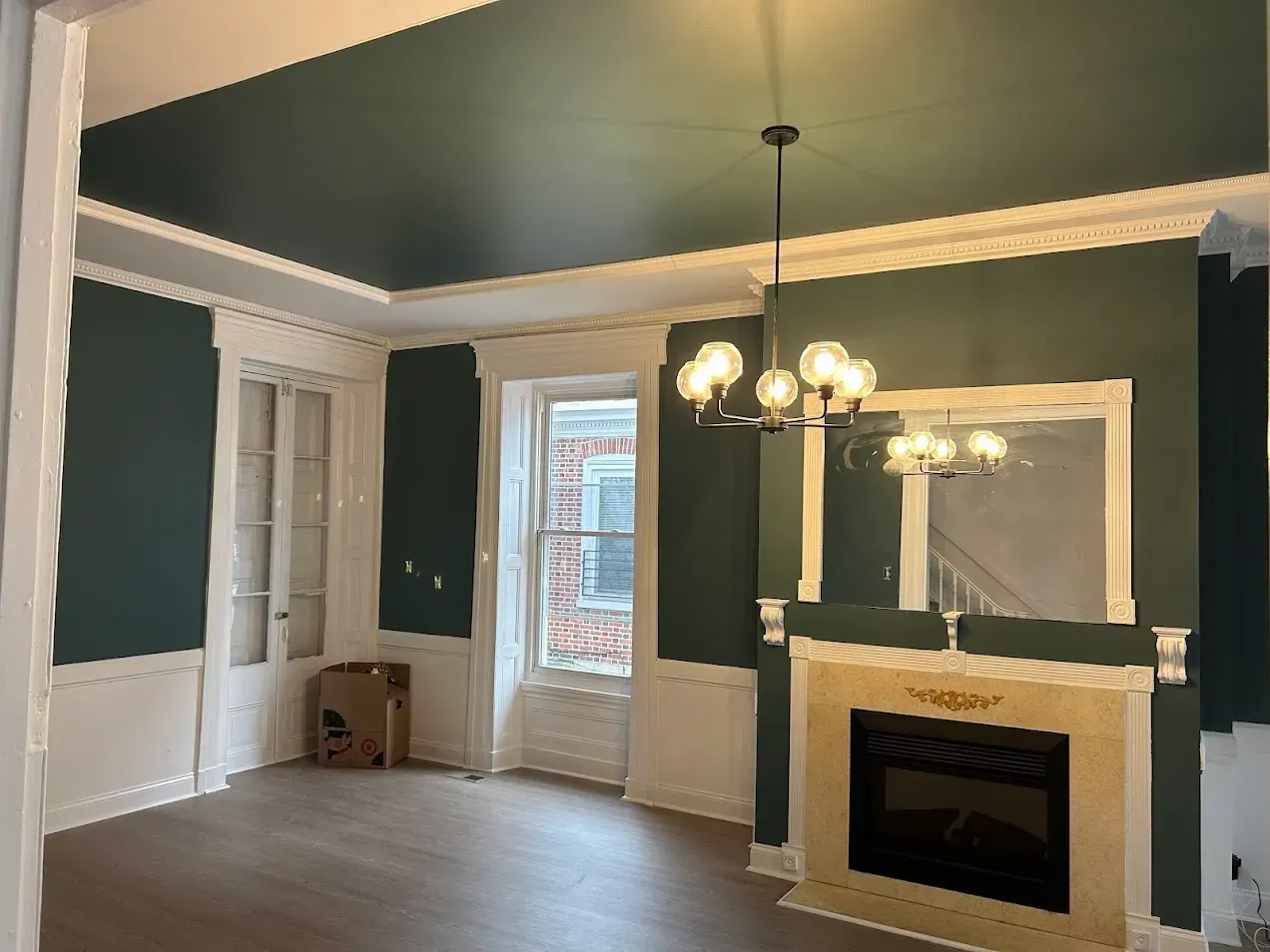 Green bedroom interior painting project completed by professional painters in Germantown, PA.