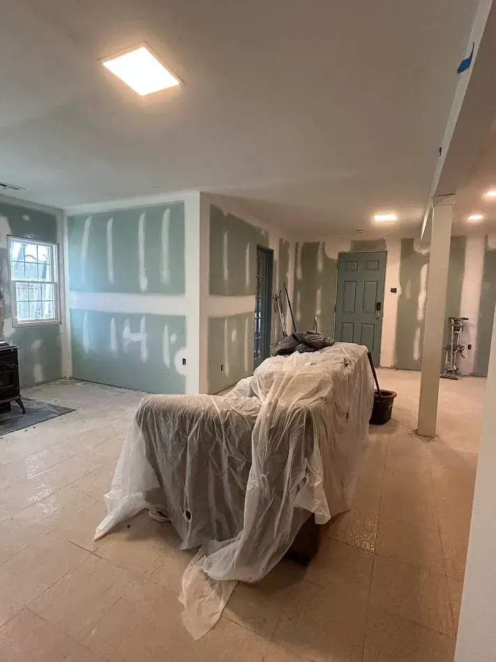 Basement drywall walls installed and finished by Oasis Painting & Drywall in Hatfield, PA.