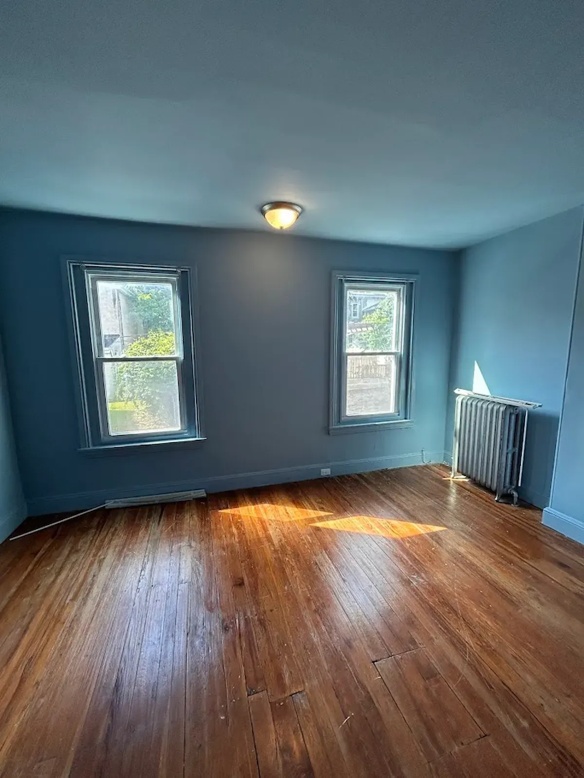 Philadelphia PA bedroom painting – blue walls, ceiling and trim by professional painters Oasis Painting & Drywall