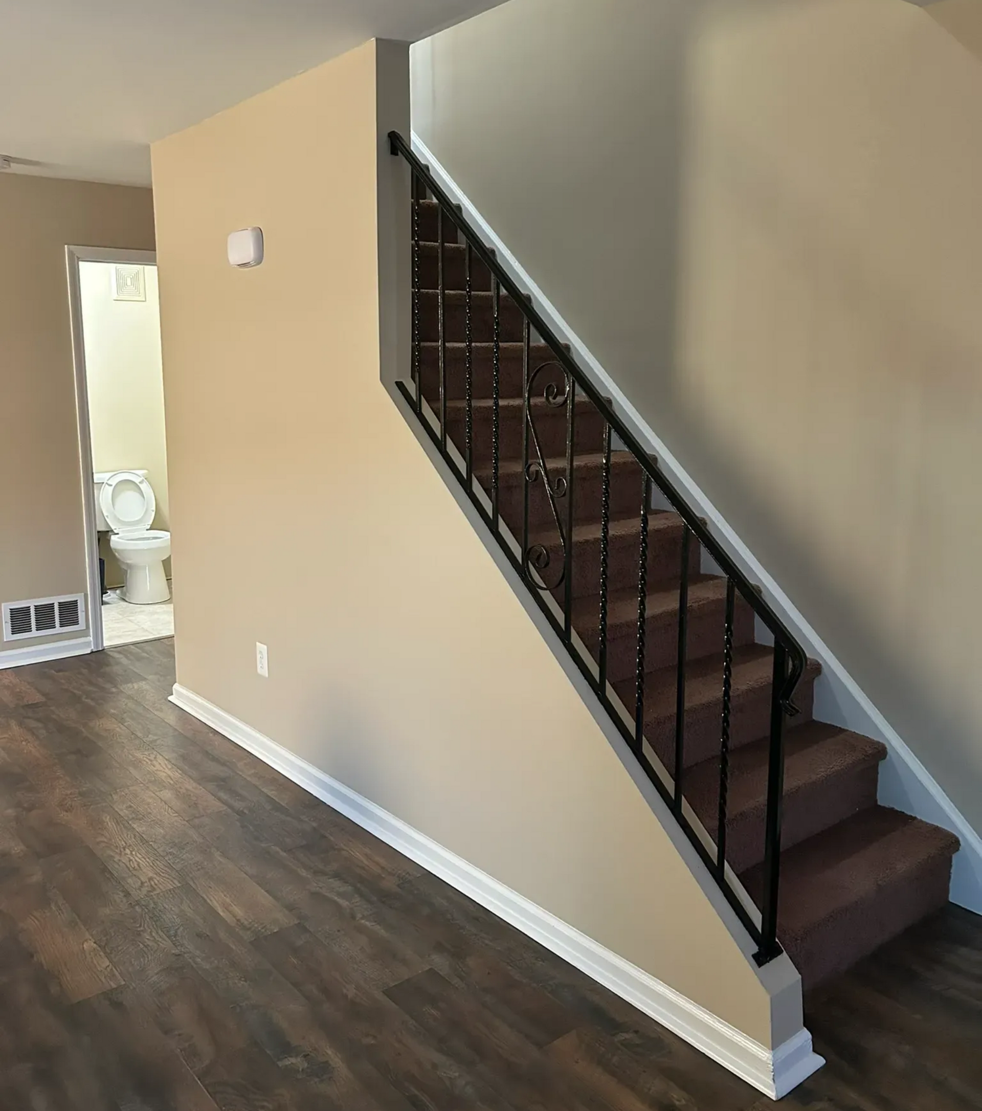 Interior painting project in Norristown PA featuring staircase and finished walls