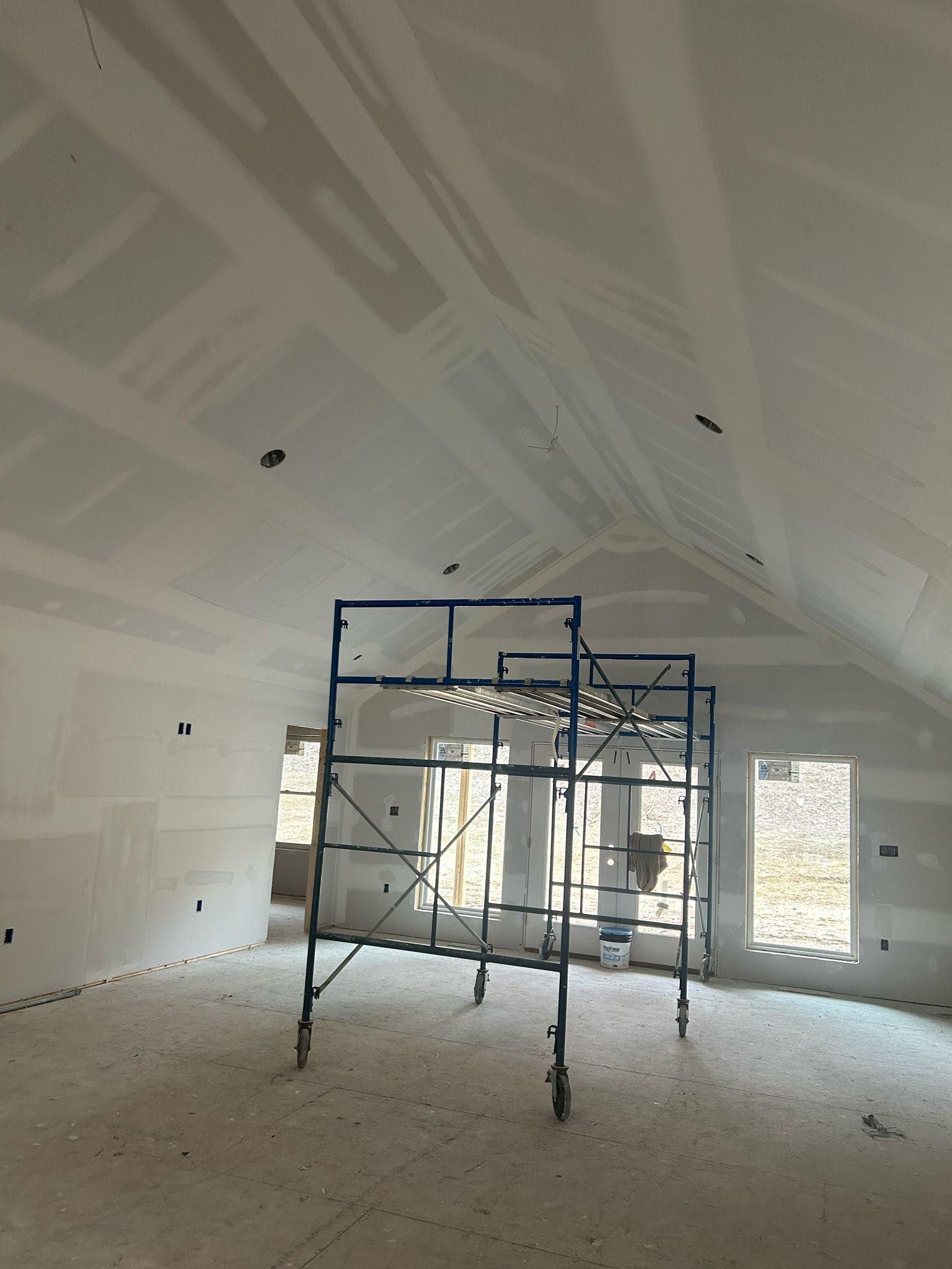 Lancaster PA drywall installation – interior room under construction with finished seams by Oasis Painting & Drywall.