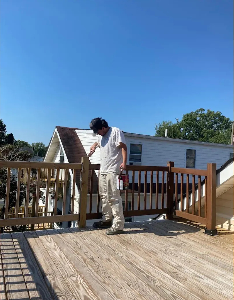 Deck painting by Oasis Painting & Drywall LLC in Philadelphia, PA — durable finish for lasting weather protection.