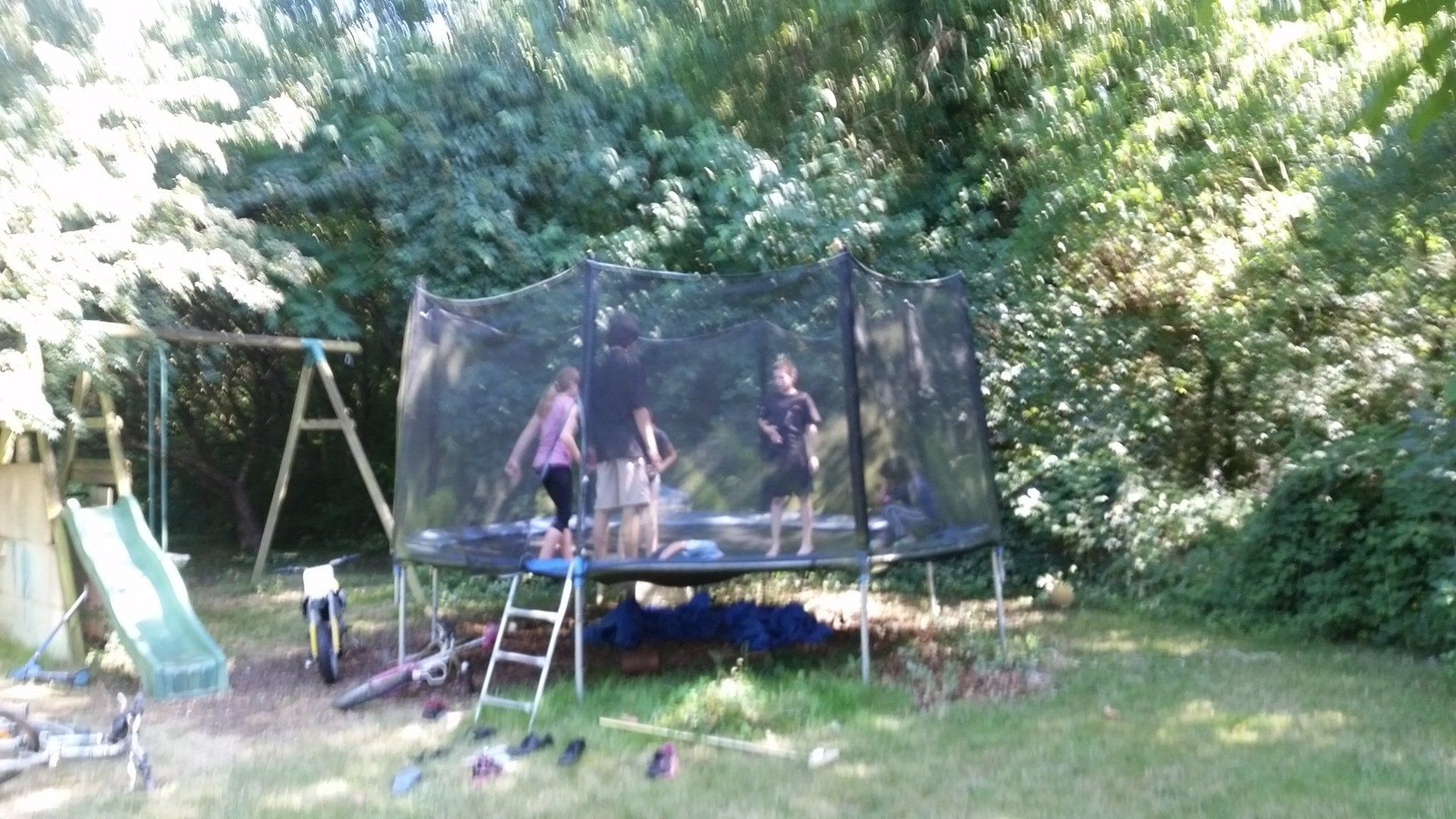 trampoline with safety net at  la grange du moulin