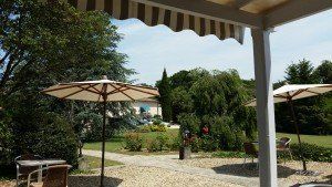 view of a garden from a restaurant table in Cognac