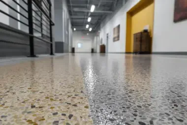 Multicolor flake epoxy flooring with glossy polyaspartic topcoat in Orlando home
