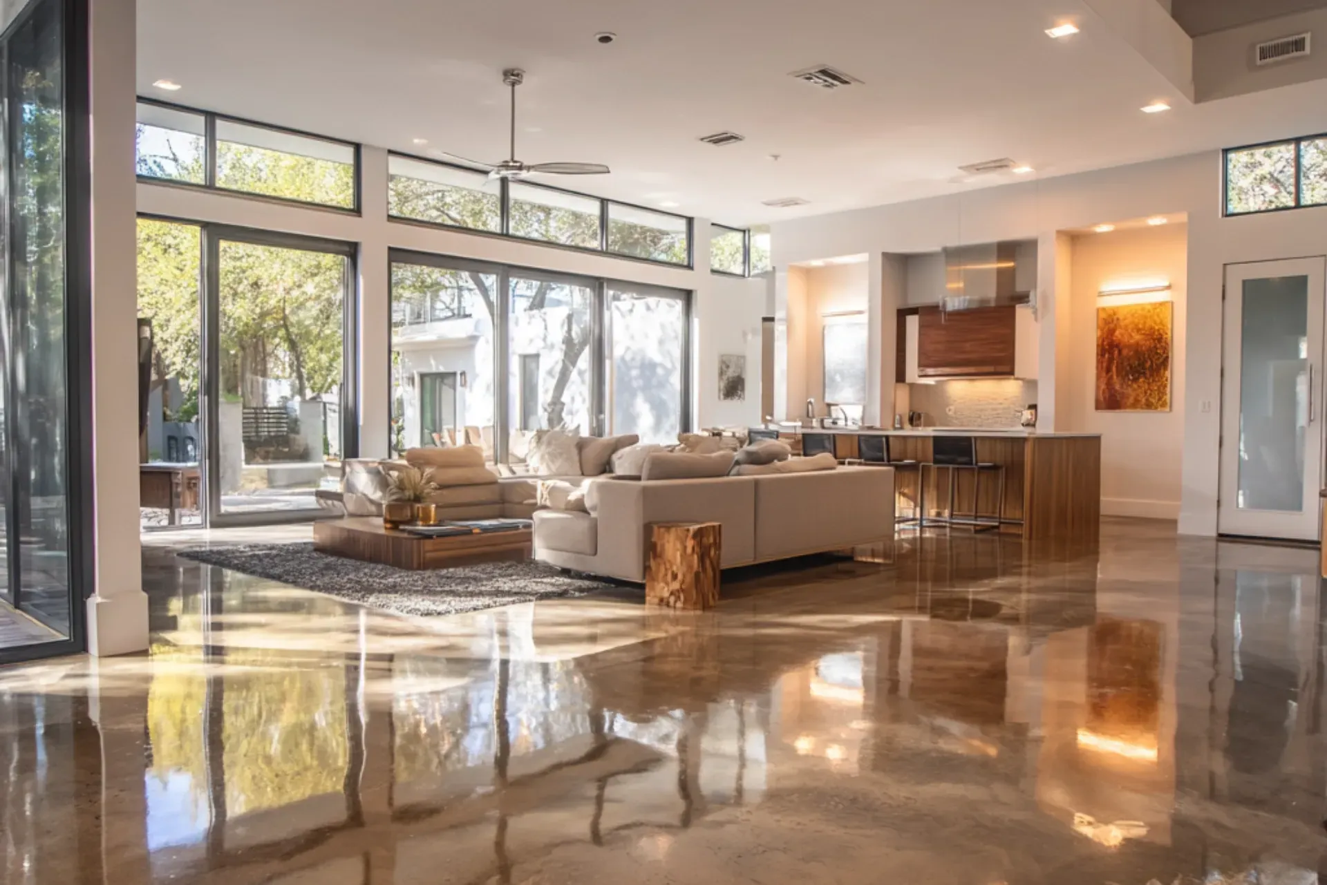 High-gloss polished concrete floor reflecting light in Orlando home