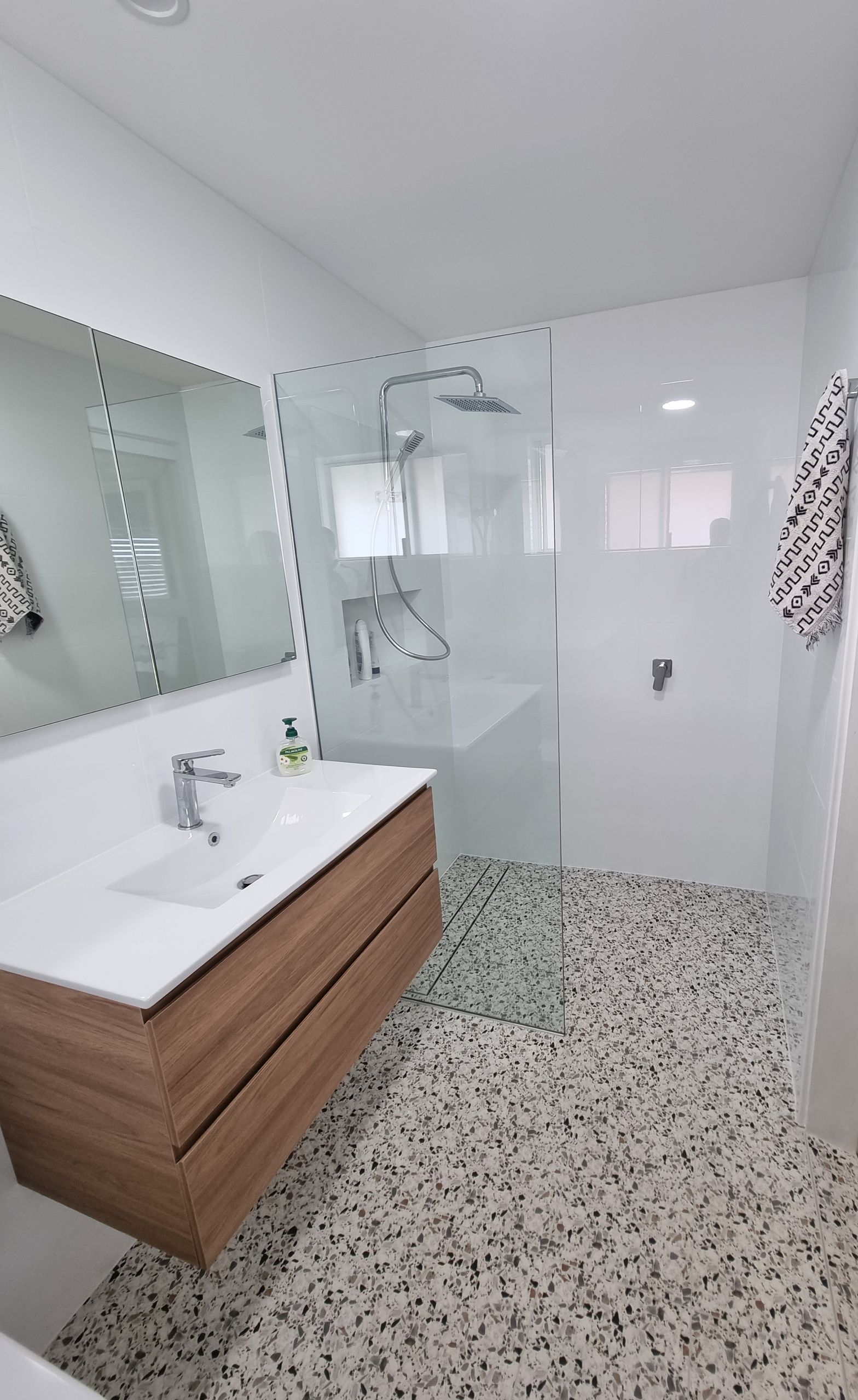 An Elegant Bathroom with Gold Highlights — L.L Projects in Forster, NSW