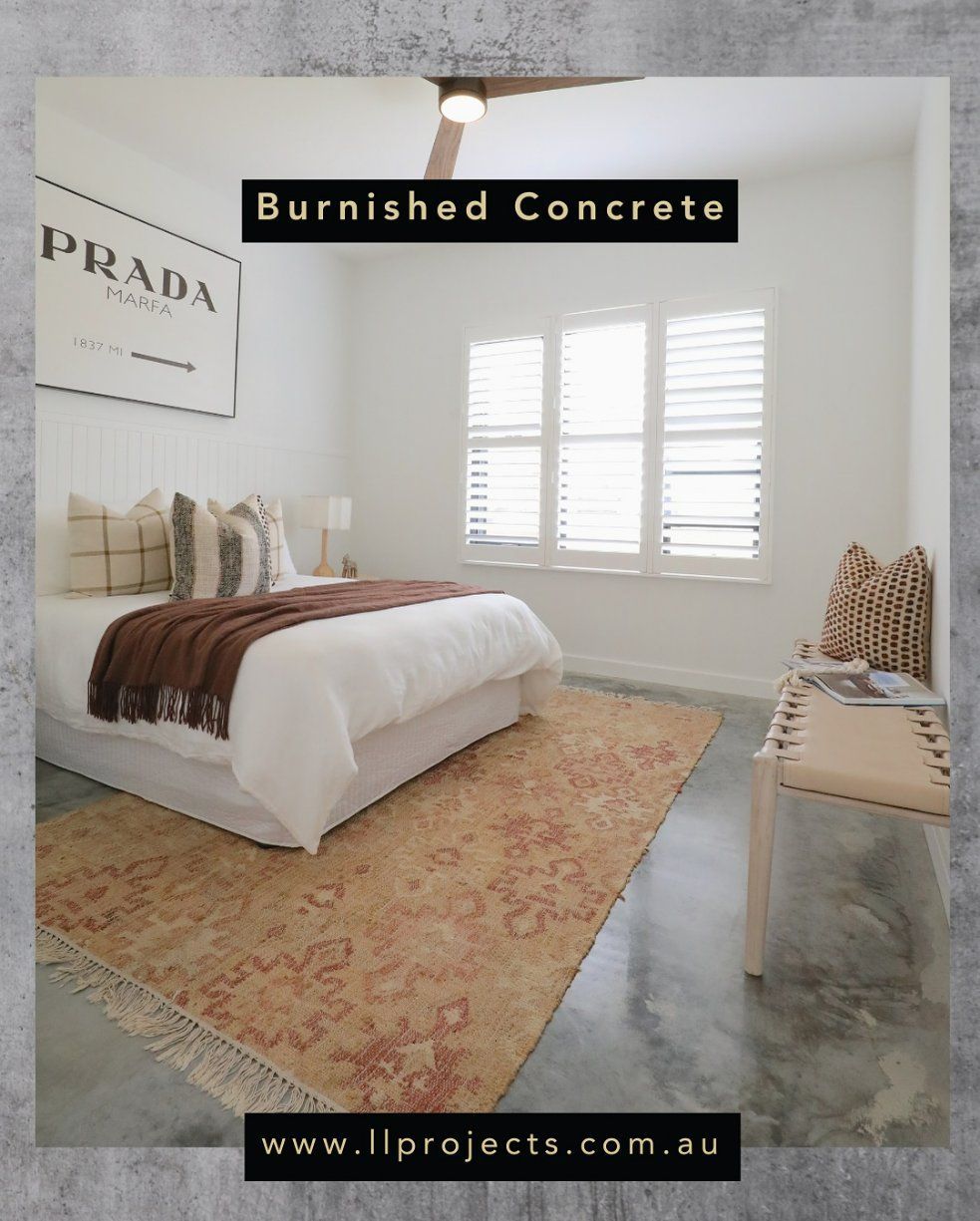 A bedroom with burnished concrete flooring — L.L Projects in Forster, NSW