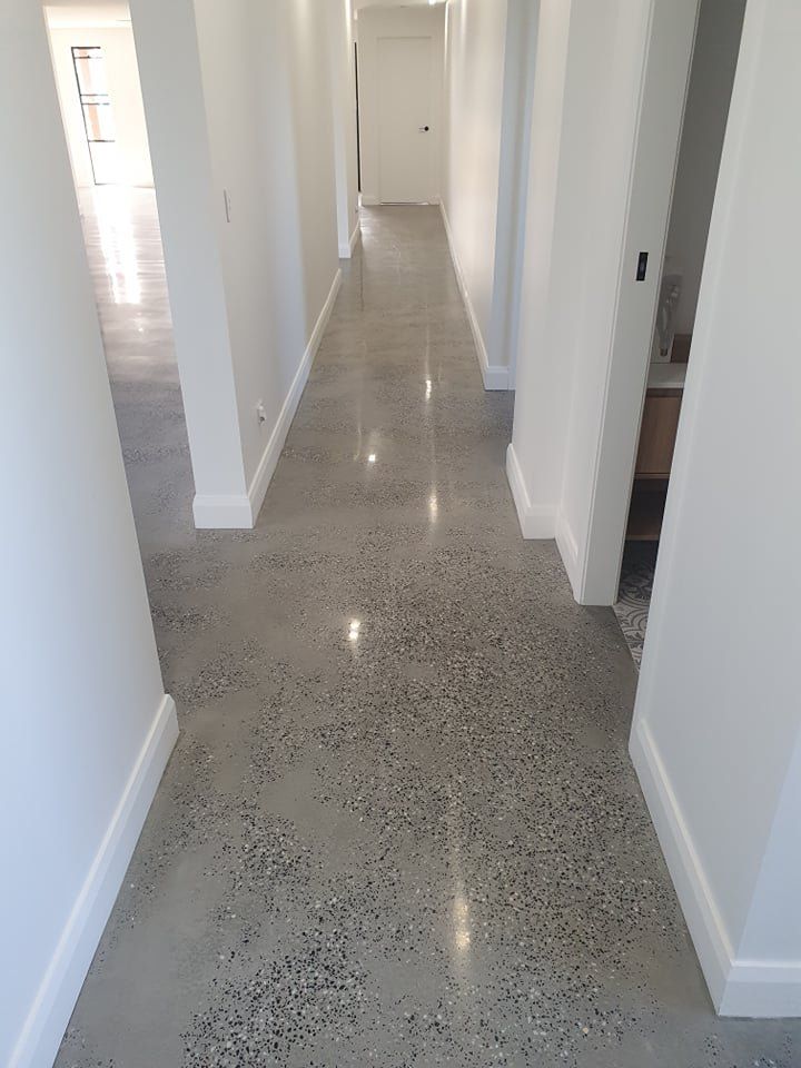 Long Galley Style Kitchen With Polished Concrete Floor — L.L Projects in Forster, NSW