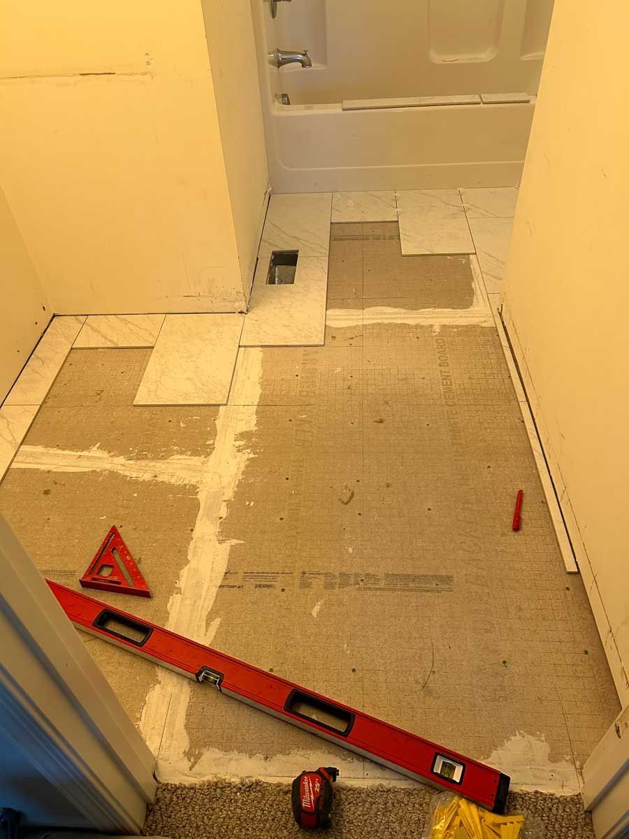 Adding Tiles To Bathroom Floor — Pittsburgh, PA — Ahrn City Contracting LLC