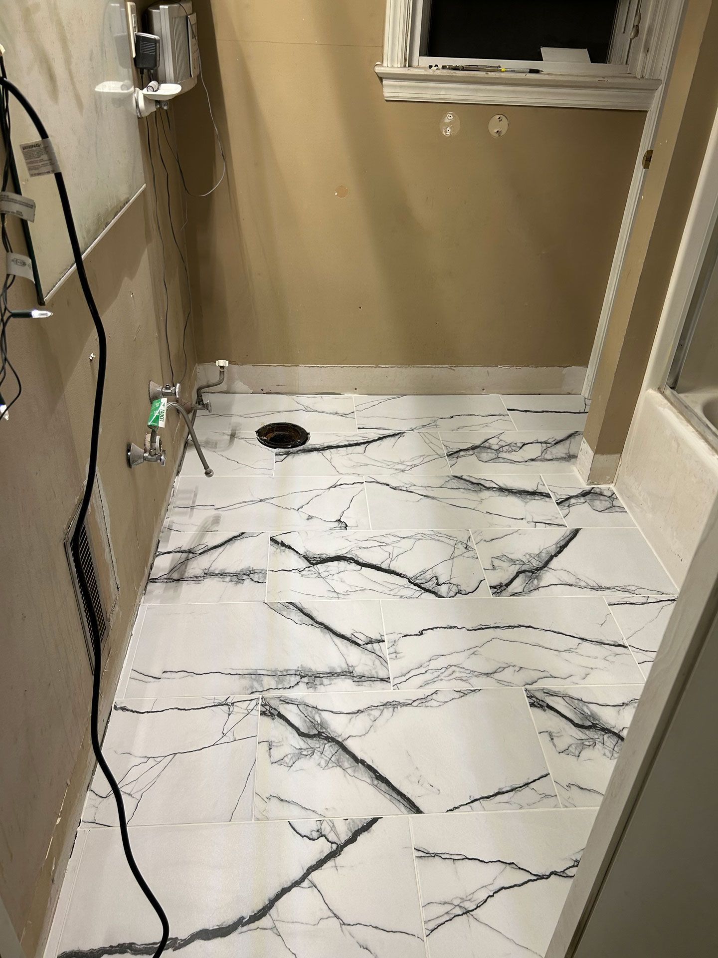 Bathroom flooring clean-up — Pittsburgh, PA — Ahrn City Contracting LLC