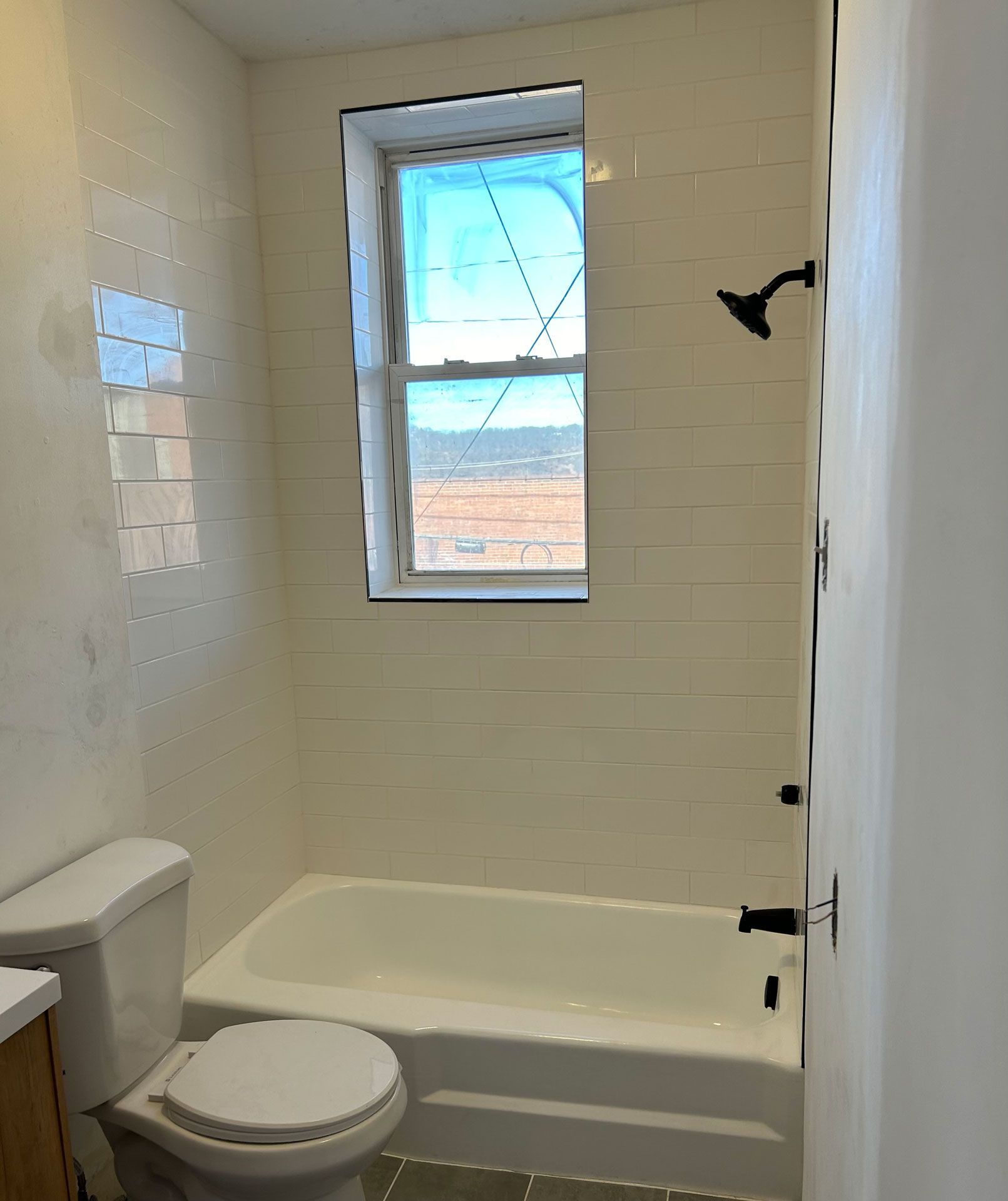 Bathroom clear window — Pittsburgh, PA — Ahrn City Contracting LLC