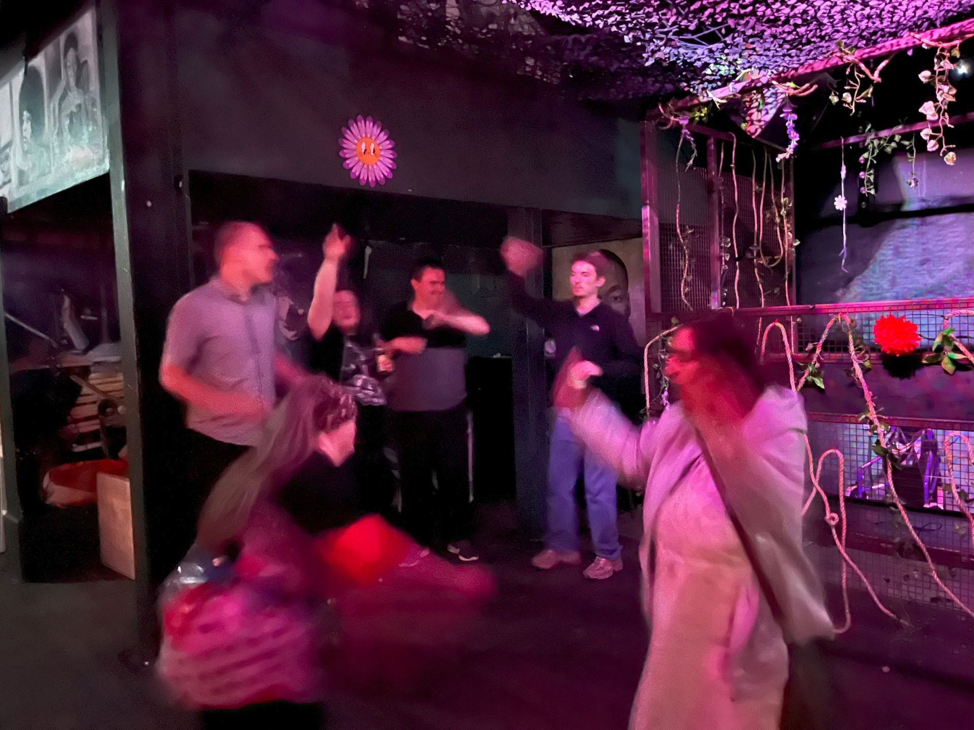 Group of people dancing in a night club