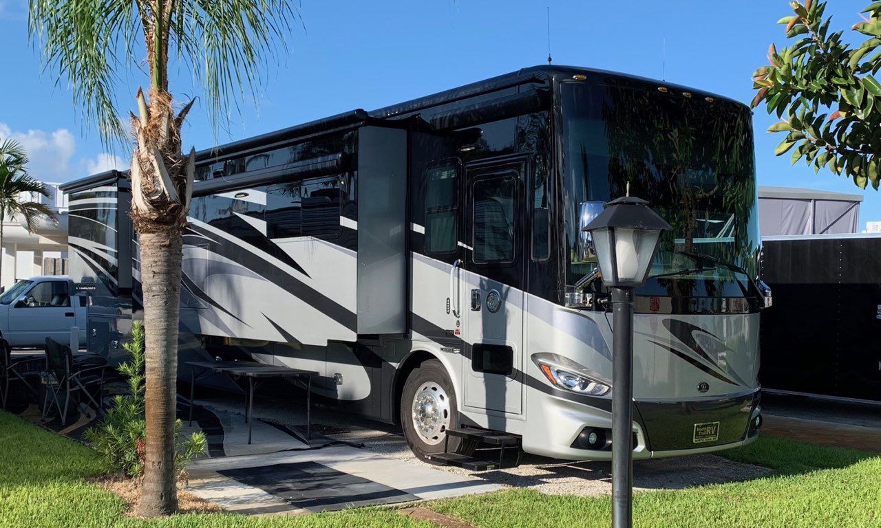 Multiple White RV Trailers — Delray Beach, FL — Del-Raton RV Park & Trailer Sales