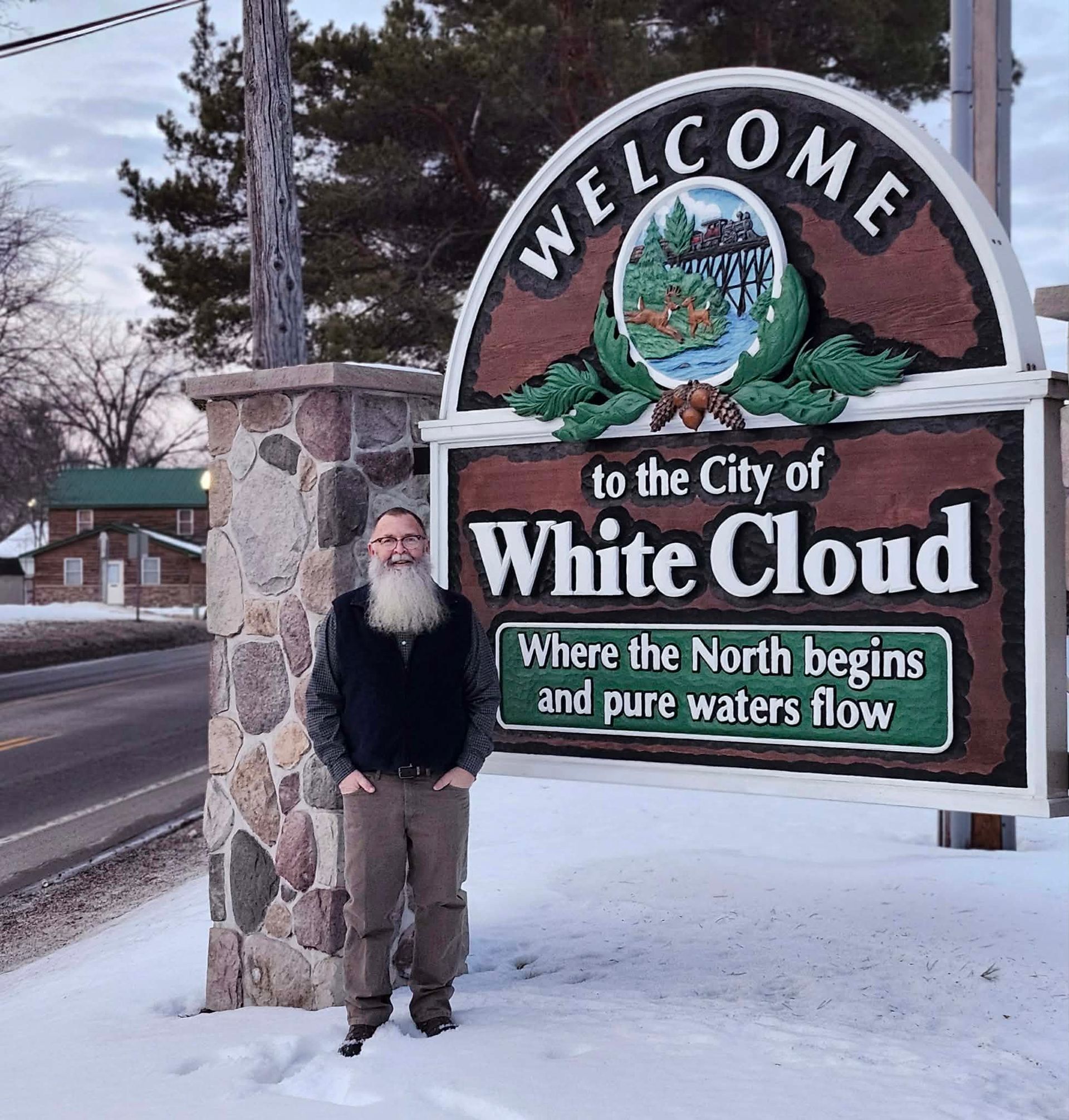 Man standing next to a