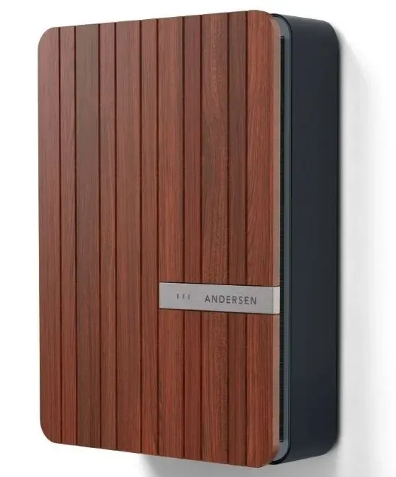 A person is opening a car door with a key.