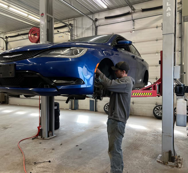 Mechanic Working on a car | Itasca Automotive
