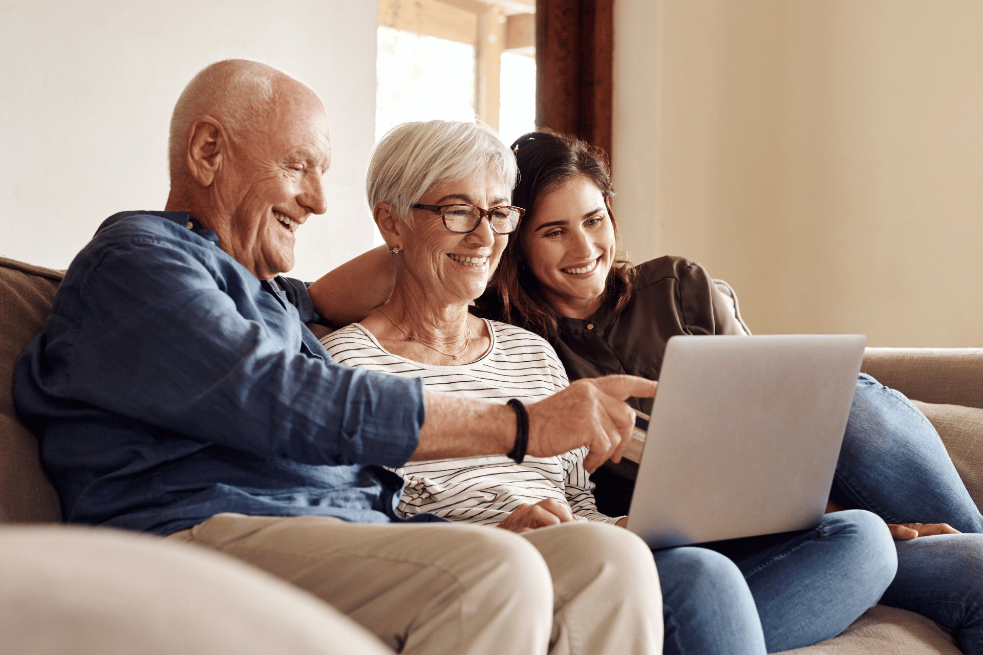 Senior couple learning how to apply for Medicare online with help from their daughter in Nebraska