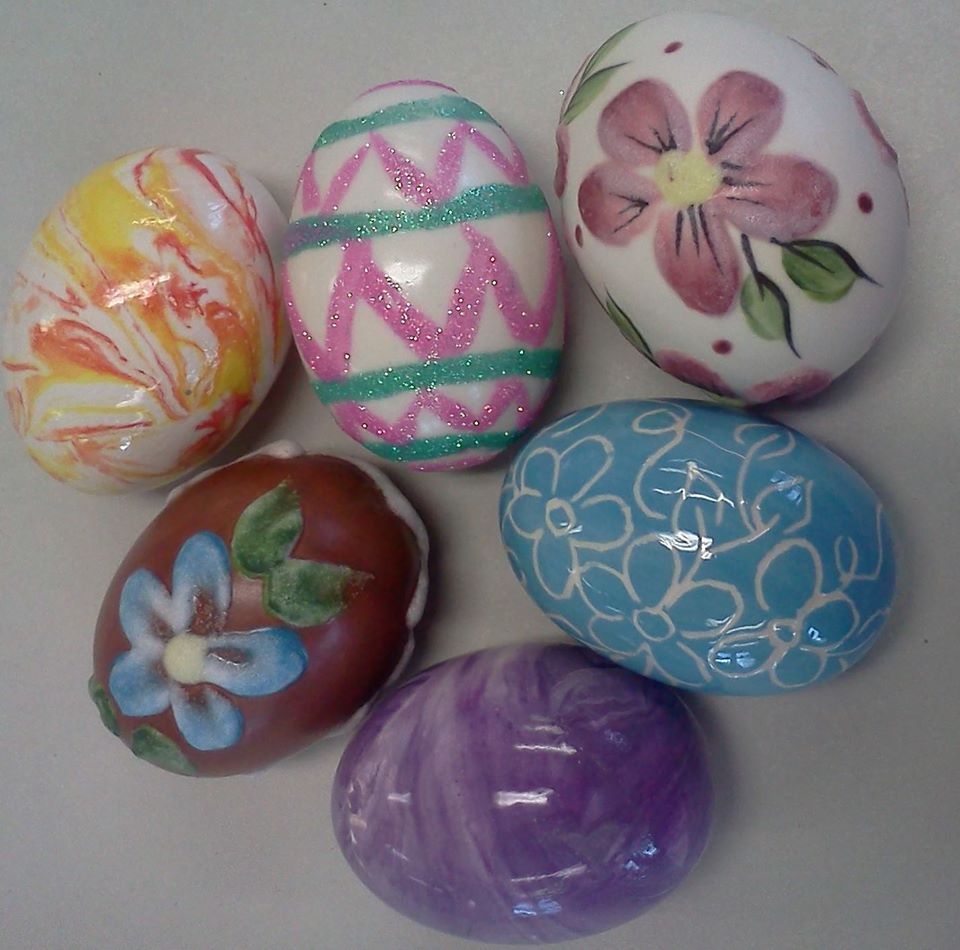 A bunch of easter eggs with different designs on them