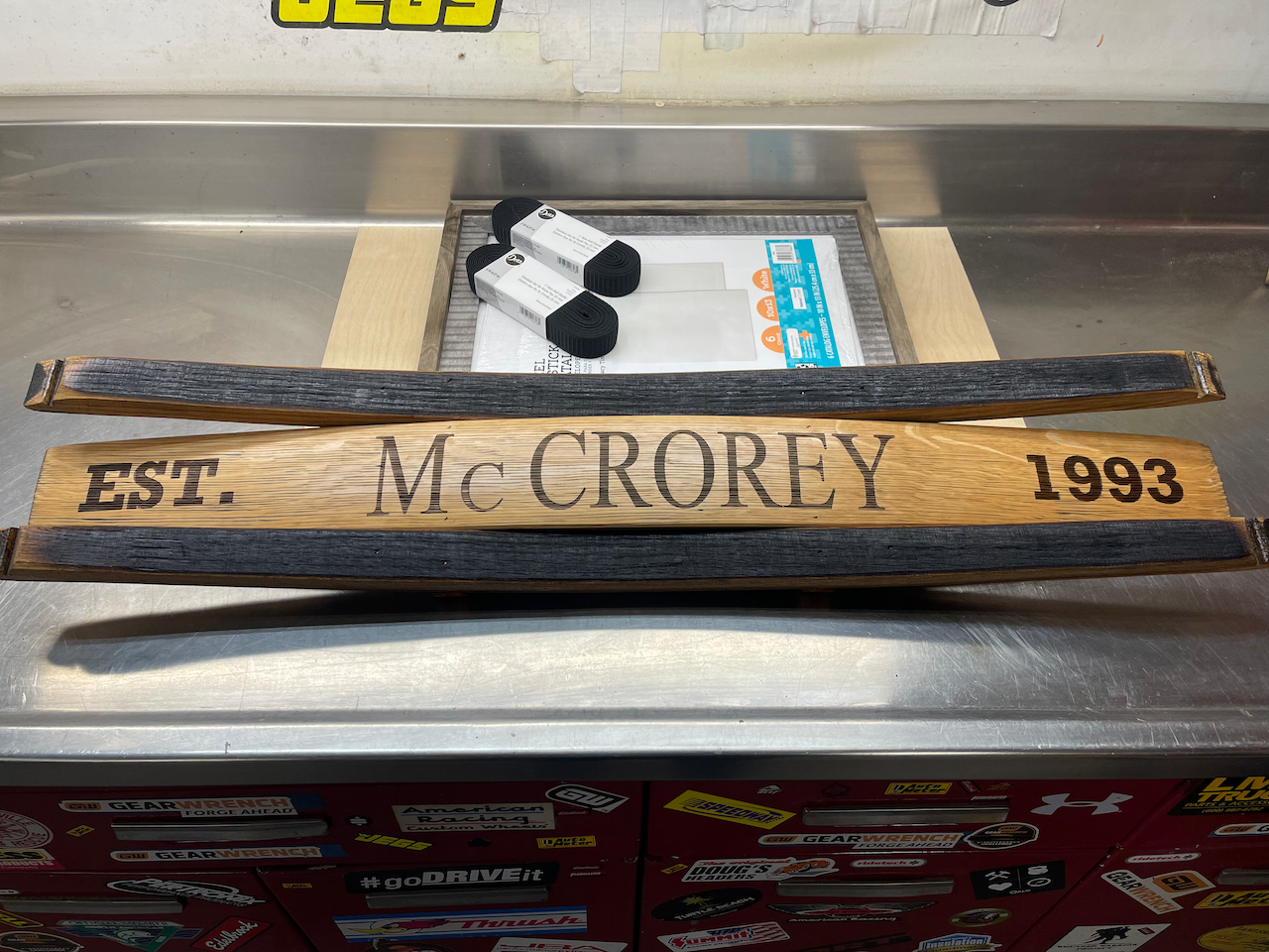A wooden sign with the name mccrorey written on it