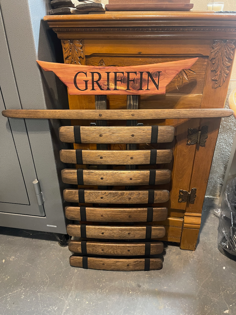 A wooden sign with the name griffin on it