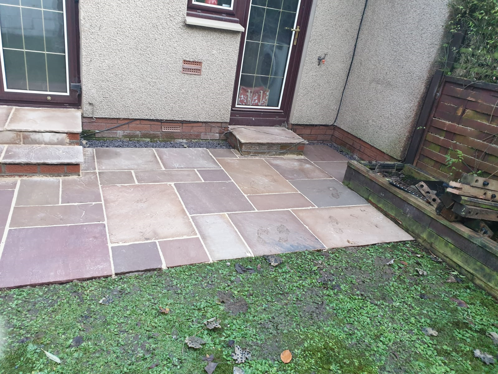 front pavement with grass